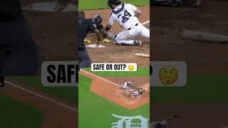 Tommy Pham was ruled SAFE after replay review against the Tigers 