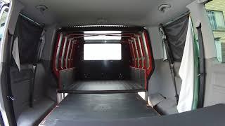 VW T5 Caravelle rear Slide-Out module, extended space for sleeping . In action . Pull and push.