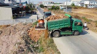 Wonderful Technique DX40M HITACHI Dozer And Dump Trucks Small filling Flooded land Next to the road