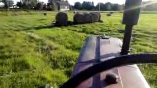 Moving hay bails