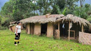 Trade-off for a safe place to give birth. Single mother cleans up warm abandoned house in the forest