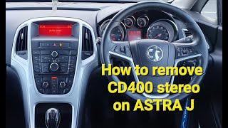 Vauxhall/Opel Astra J CD400 factory stereo removal @TheCarWorkshop