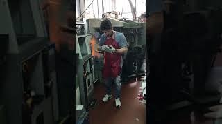 Italian factory putting sole on shoe