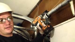 Installing A Garage Door Part 4- Tensioning the EZ- Set Torsion Spring