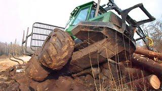 John Deere 810D stuck in  mud