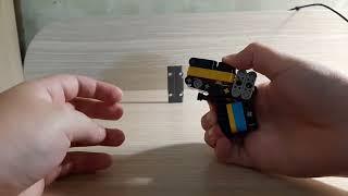 lego small 3 stud wide shell enjecting pistol by _tyccc_  tutorial? (_tyccc_ watch me)