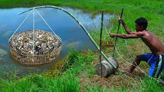 Primitive technology - Making Trap To Catch Catfish using Bamboo to lure fish Trap Work 100%