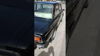 Black Beast Classic Lada on the Street of Smarkand Uzbekistan