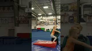 Meadow getting some backhandspring work in.