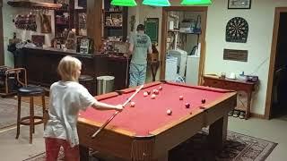 Ali plays pool