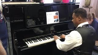 Kris Nicholson test drives a brand new Kawai K-800 Upright At Namm 2020