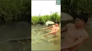Risking It All! Young Man Faces Fish Showdown in the Pond - Will He Catch or Get Caught?