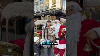 Aleksandra Subotić with Santa and son traying Serbiran street food ‍️