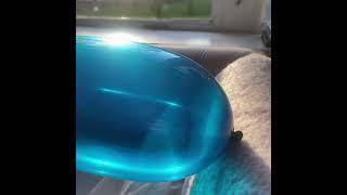 Big, 5x dipped, long neck blue balloon being inflated