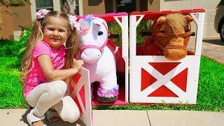 Diana and Roma Plays with toy horses