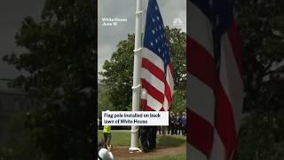 Flag pole installed on back lawn of White House