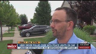 Uber driver pulled over with police lights on car
