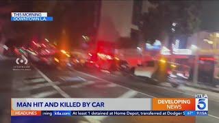 Man dies after being pinned under car in downtown L.A., driver in custody