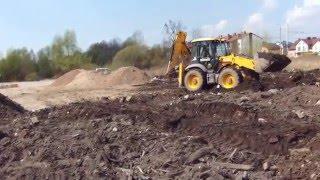 Отсыпка участка под застройку погрузчиком JCB 4CX - steh39.ru