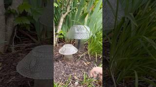 How to reuse thrifted or yard sale glass items to make glowing glass mushroom decor for the garden.