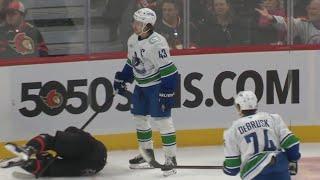 Quinn Hughes Game Misconduct for Boarding Josh Norris