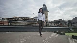 White shirt pleated skirt and highheels shoes (slow motion walk)