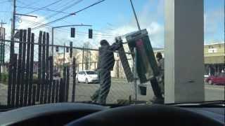 2 black guys steal a telephone booth