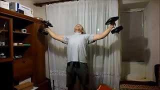 Крест с гантелями по 24кг. Iron cross with 24kg dumbbells.