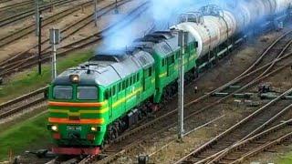 Locomotive 2M62U-0008 with maintenance train at station Jumprava.