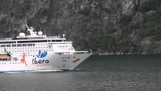 TWO CRUISE SHIPS RACE ONE ANOTHER IN A NORWEGIAN FJORD