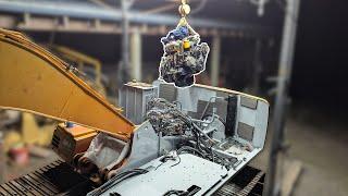 Installing the engine and hydraulic pump into an excavator - Hitachi EX120-2