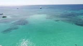 West Bay Beach Roatan Honduras: ️ Stunning 4K Drone Views of Crystal Clear Caribbean Water