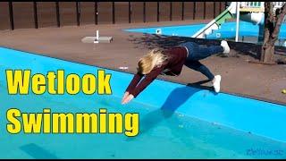 Wetlook swimming in pool | Wetlook wetting girl