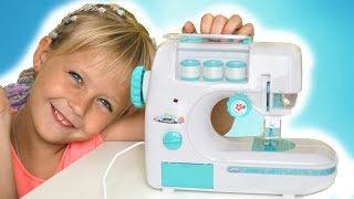 Margo and Mommy playing with Toy Sewing machine