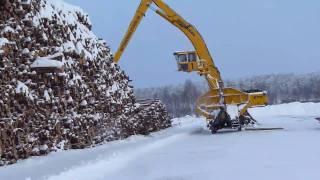 Sennebogen 870 M special  loading timber on truck