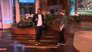 Justin Bieber and Usher dancing.