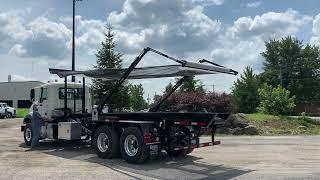 Roll-off Top Skid Truck with Pioneer Canvas System in action – DRC-6022-TS model