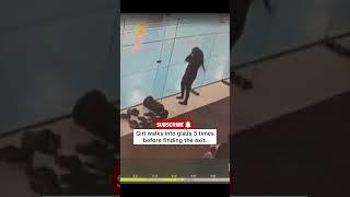 Girl walks into glass 3 times before finding the exit.