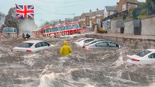 Horrible flooding in Manchester in England. Houses, streets and cars are under water! Alert