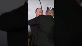 Vladimir Putin embraces Kim Jong-un as he lands in North Korea