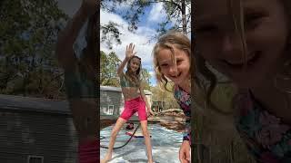 Gymnastics on the slip n’ slide with my siblings again