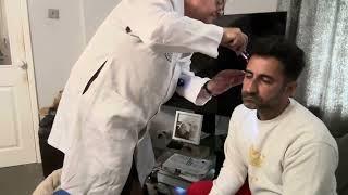 ASMR Dr Seymour Klearly does cranial nerve checks