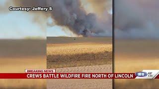 Fire departments respond to wild fire north of Lincoln; several houses evacuated along Branched O...