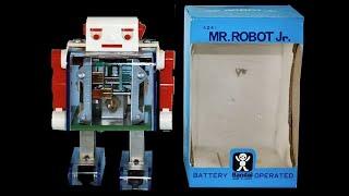 Vintage robots with Linear shuffle walking action. Robot Hut.