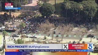 Immigration march blocks roads in downtown Los Angeles