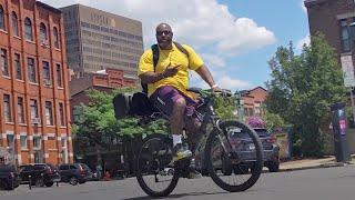 Boom box biker gets heads bopping in Syracuse