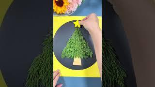 Use leaves to make a Christmas tree with your children. Handmade DIY. Parent-child crafts. Kinderga