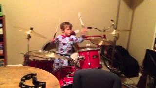 Charlie's first time on a drum set