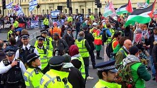 Police detain Pro-Palestine supporters as thousands march by Pro-Israel counter protest in London