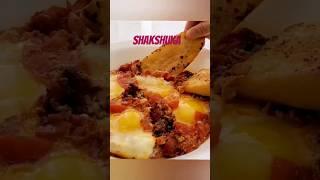 Shakshuka eggs poached in a sauce of tomatoes #shortvideo #cooking #food #recipe #easyrecipe #yummy